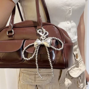 sg-11134201-7rdvx-ly21cfzxb32oc7.webp Bow Shaped Keychain